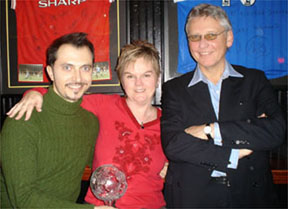 George Costacos receives the George Best Tyrone Irish Crystal Footbal from Barbara and Norman McNarry